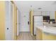 Condo entry with kitchen and closet at 6403 Parc Corniche Dr # 4309, Orlando, FL 32821