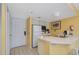 Small condo kitchen with appliances at 6403 Parc Corniche Dr # 4309, Orlando, FL 32821