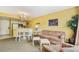 Living room with sofa, chairs, and TV at 6403 Parc Corniche Dr # 4309, Orlando, FL 32821