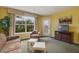 Living room with sofa and large window at 6403 Parc Corniche Dr # 4309, Orlando, FL 32821
