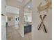 Entryway view of kitchen and staircase at 7544 Gathering Dr, Kissimmee, FL 34747