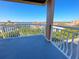 Private balcony overlooking a lake and residential area at 7580 Toscana Blvd # 834, Orlando, FL 32819
