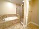 Bathroom with shower and garden tub at 7580 Toscana Blvd # 834, Orlando, FL 32819