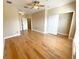 Bright and airy bedroom with hardwood floors and ample closet space at 7580 Toscana Blvd # 834, Orlando, FL 32819
