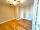 Bright bedroom with hardwood floors and French doors at 7580 Toscana Blvd # 834, Orlando, FL 32819