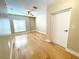 Large bedroom with hardwood floors and lots of natural light at 7580 Toscana Blvd # 834, Orlando, FL 32819