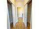 Hallway with two large closets and access to bathroom at 7580 Toscana Blvd # 834, Orlando, FL 32819