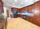 Modern kitchen featuring ample cabinetry, granite countertops and stainless steel appliances at 7580 Toscana Blvd # 834, Orlando, FL 32819