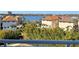 Panoramic lake view with neighboring homes visible at 7580 Toscana Blvd # 834, Orlando, FL 32819