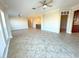 Open living area with neutral color palette and tile floors at 7580 Toscana Blvd # 834, Orlando, FL 32819