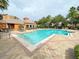 Inviting community pool with surrounding patio at 7580 Toscana Blvd # 834, Orlando, FL 32819