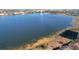 Stunning aerial view of lake and surrounding landscape at 8737 The Esplanade # 65, Orlando, FL 32836