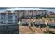 Aerial view of lakefront community with resort-style amenities at 8737 The Esplanade # 65, Orlando, FL 32836