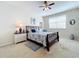 Bright bedroom with a comfortable bed and plenty of natural light at 8737 The Esplanade # 65, Orlando, FL 32836