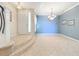 Bright dining room with tile floors and neutral walls at 8737 The Esplanade # 65, Orlando, FL 32836