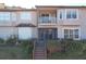 Two-story home with deck and lake view at 8737 The Esplanade # 65, Orlando, FL 32836