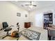 Spacious home office with built-in shelving and a desk at 8737 The Esplanade # 65, Orlando, FL 32836