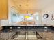 Kitchen with granite countertops and a double sink overlooking the Gathering room at 8737 The Esplanade # 65, Orlando, FL 32836