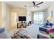Lake view living room with comfy seating and plenty of natural light at 8737 The Esplanade # 65, Orlando, FL 32836