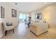 Living room with lake view and access to balcony at 8737 The Esplanade # 65, Orlando, FL 32836