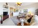 Spacious living room with comfortable seating and a view into the kitchen at 8737 The Esplanade # 65, Orlando, FL 32836
