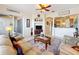 Bright living room featuring comfortable seating, access to a patio, and an open floor plan at 8737 The Esplanade # 65, Orlando, FL 32836