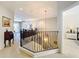 Spacious loft with a chandelier, overlooking the main living area at 8737 The Esplanade # 65, Orlando, FL 32836