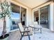 Relaxing patio with lake view and outdoor seating at 8737 The Esplanade # 65, Orlando, FL 32836