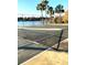 Recreational tennis court with lake views at 920 Lake Destiny Rd # F, Altamonte Springs, FL 32714