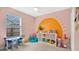 Playful ' room with a sun mural and toy storage at 100 Kelly Cir, Sanford, FL 32773