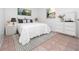 Bright bedroom with a double bed and white dresser at 100 Ledbury Dr, Longwood, FL 32779