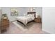 Cozy bedroom with a double bed and wood nightstands at 100 Ledbury Dr, Longwood, FL 32779