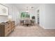 Dining room features a table with chairs and a modern chandelier at 100 Ledbury Dr, Longwood, FL 32779