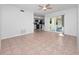 Living room with tile floors and access to backyard at 100 Ledbury Dr, Longwood, FL 32779