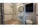 Accessible bathroom featuring a walk-in shower and safety rails at 1001 Park Ridge Cir, Kissimmee, FL 34746