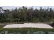 Beach area with palm trees and gazebo at 1001 Park Ridge Cir, Kissimmee, FL 34746