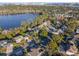 Aerial view of the neighborhood and lake at 10125 Canopy Tree Ct, Orlando, FL 32836