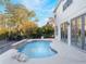 Inviting pool area with deck and a relaxing atmosphere at 10125 Canopy Tree Ct, Orlando, FL 32836