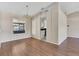 Bright dining room with hardwood floors and view into kitchen at 1101 Swanson Dr, Deltona, FL 32738