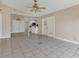 Dining area with tile floors and view into kitchen at 1101 Swanson Dr, Deltona, FL 32738