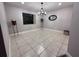 Bright dining room with chandelier and tile flooring at 1461 Lancelot, Casselberry, FL 32707