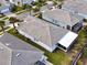 Aerial view showcasing the home's roofline and backyard at 1506 Bunker Dr, Davenport, FL 33896