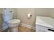 Clean bathroom with toilet, shower, and vanity at 1506 Bunker Dr, Davenport, FL 33896