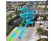 Community water park with slides and a tower at 1506 Bunker Dr, Davenport, FL 33896