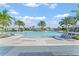 Community pool with plenty of lounge chairs at 1593 Bull Hill Rd, Kissimmee, FL 34744