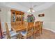 Formal dining area with wooden table and chairs, perfect for Gathering gatherings at 15937 Birchwood Way, Orlando, FL 32828