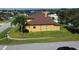 House's side view showcasing its size and yard space at 15937 Birchwood Way, Orlando, FL 32828