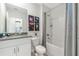 Clean bathroom featuring a bathtub, granite countertop, and star-themed decor at 1597 Bull Hill Rd, Kissimmee, FL 34744