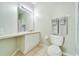 Clean bathroom with single sink vanity and toilet at 2249 Wyndham Palms Way, Kissimmee, FL 34747