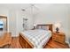 Bedroom with wood bed frame, hardwood floors at 2249 Wyndham Palms Way, Kissimmee, FL 34747